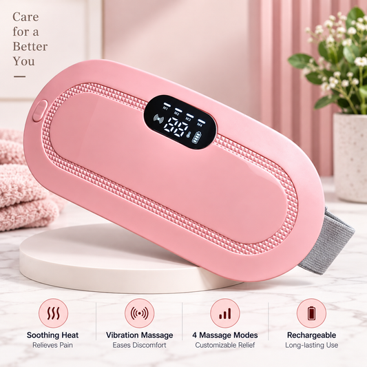 A pink handheld massage device with a digital display screen, resting on a white round tray. The background features soft pink curtains, a potted plant, and folded pink towels, with four feature icons at the bottom highlighting soothing heat, vibration massage, 4 massage modes, and rechargeable use.